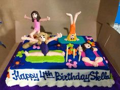 a birthday cake with three girls on it