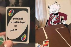 someone holding up an unopened card in front of a table with stickers on it