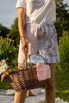 Two-tone pink gingham shorts with blue and white striped floral patterns made from upcycled cotton from household linen. Ideal for facing the heatwave of summer, while remaining stylish!  - All second-hand fabrics have been washed at 60oC. - The model is 1.69m tall and wears a size S. - The fabric of the shorts is not completely opaque. We advise you to wear white/skin-color underwear. - Size S/M fits a 74-81cm waist. Size M/L fits a 82-90cm waist. - Length of shorts approx. 39/40cm - Unisex Summer Gingham Beach Shorts, Gingham Shorts With Pockets, Summer Gingham High-waisted Shorts, Gingham Cotton High-waisted Shorts, Gingham Summer Bottoms With Built-in Shorts, Gingham Shorts, Pink Gingham, Floral Stripe, Sewing Inspiration