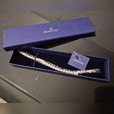 New In Original Sealed Box #5422684, Never Worn Swarovski Pearl Bracelet Is On-Trend: - Has A Secure Fold-Over Clasp Closure & Comes With An Extender - Strand Of Bezel-Set Clear Crystals Offers An Elegant & Minimalist Look Ideal For Everyday Wear - Rhodium Plated - Medium Size: ~6.75" Length Swarovski Pearls Bracelet, Pave Bangle, Jewelry Swarovski, Lace Bracelet, Faux Pearl Bracelet, Swarovski Bracelet, Toggle Bracelet, Hinged Bracelet, Gold Plated Bracelets