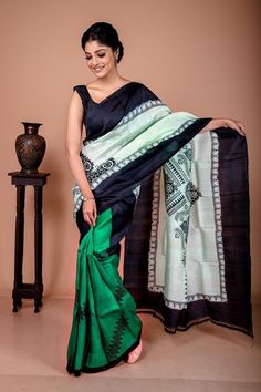 There are different motifs present in the saree. Also, they are not similar to each other. A tribal style of hand block printing is in this never seen combination of mulberry silk saree. This bottle green silk saree itself represents the tribal motifs. The color compliments the beautiful tribal print in this pure silk saree. Also, the saree is silk mark certified. Hence, you don't have to worry about the quality of this printed silk saree. The fashion craze is all about following the latest trends. Also, this saree never gets out of trend. Hence, it is the most treasured outfit for the fashion buffs like you which you can sport whenever you like to. Beyond any limitations This bottle green silk saree is beyond any limitations. It has a very sober and subtle color. We have spotted many wome Black Block Print Saree With Traditional Drape, Black Saree With Block Print And Traditional Drape, Black Traditional Wear With Block Print, Black Block Print Blouse Piece For Diwali, Black Blouse Piece With Block Print For Diwali, Diwali Black Blouse Piece With Block Print, Traditional Green Pre-draped Saree With Kalamkari Print, Green Block Print Traditional Wear For Diwali, Green Traditional Wear With Block Print For Diwali