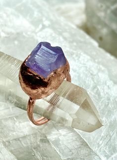 A beautiful natural amethyst crystal ring with copper.  Really beautiful ring! Size 5 1/8" approx. The amethyst has been electro formed with copper.  It measures 5/8" x 1/2" x 3/4" approx.  A beautiful statement ring!  Please let me know if you have any questions.  Check out our website for more cool stuff.  earthandstar.art Purple Gemstone Copper Jewelry, Purple Electroformed Amethyst Jewelry, Unique Large Stone Amethyst Ring Gift, Unique Amethyst Ring With Large Stone For Gift, Unique Amethyst Ring With Natural Stones For Healing, Unique Purple Crystal Ring As Gift, Hand Forged Amethyst Ring As Gift, Unique Purple Crystal Gift Ring, Rose Gold Amethyst Crystal Ring With Gemstone