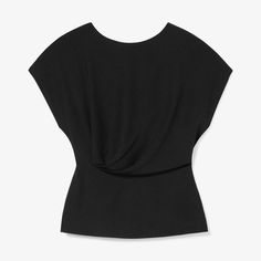 The Nejvi top is the intersection of three of our favorite things: a classic tee shape, elegant draping, and machine-washable, travel-friendly fabric. A seam at the natural waist counters a relaxed fit through the shoulders and chest, creating a sleek shape. We've updated our Soft Wave fabric to incorporate 35% recycled polyester. It still has all the qualities you love—machine-washability, wrinkle-resistance, odor-resistance, and a lightweight feel—but with an eco-friendly upgrade. This piece h Summer Modal Fitted Top, Summer Fitted Modal Top, Fitted Modal Top For Summer, Versatile Fitted T-shirt, Versatile Fitted Modal Top, Chic Black 4-way Stretch Tops, Chic Viscose Crew Neck Top, Chic Elastane Tops For Layering, Chic Solid Modal Tops