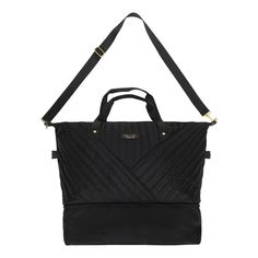 Travel in style with this Rachel Rachel Roy deluxe duffel bag. The bag features a black quilted fabric pattern with gold letters that spell out the designer's logo on the front and zippers. The bag comes with an adjustable strap, a spacious zipper compartment, and a separate shoe compartment that zips closed to store your footwear. The bag features a trolley pass through that lets you easily attach it to a luggage cart. The duffle bag is made with polyester and webbing materials and measures 22" Black Shoulder Bag For Overnight Trips With Zipper, Black Shoulder Bag For Overnight Trips, Black Shoulder Bag With Zipper For Overnight Trips, Black Quilted Functional Bag, Functional Black Quilted Bag, Quilted Black Bag For On-the-go, Black Quilted Bag For On-the-go, Black Weekender Bag With Zipper For Overnight Trips, Black Duffle Bag With Zipper Closure For Weekend Trips