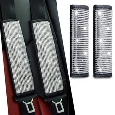 pair of black and white car seat back covers with crystal rivets on each side