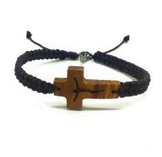 "This beautiful cross bracelet is handmade in Medjugorje by a member of our family. Made with waxed cord, olive wood cross and Divine Mercy / Virgin Mary medal on closure. Adjustable sliding knot. In adult size 9.5 inches (24 cm) when fully opened. Fits adults and teens a like. You can also choose size for a child. This bracelet is great gift for yourself or someone dear to you. For occasions like Birthday, graduation, first communion or confirmation. Message card of Holy Lady from Medjugorje in Adjustable Brown Cross Bracelet, Brown Cross Bracelet Spiritual Style, Spiritual Brown Cross Bracelet, Handmade Adjustable Cross Bracelets, Jesus Bracelet, St Peregrine, Catholic Bracelet, Olive Wood Cross, Hope Bracelet