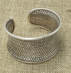 "Braided Sterling Silver Statement Boho Cuff Bracelet, Handmade Wide Woven white Silver Ethnic Bangle, Tribal Weave Adjustable Cuff Width: Front side 1 9/16 inches (1.6\") / 4cm Longer versions (2.75\" and 4.3\"): https://www.etsy.com/listing/603575462 https://www.etsy.com/listing/569455658 Metal Purity: 95% Silver (Purer than 925 Sterling Silver) We also have designs version of Braided cuff : https://www.etsy.com/listing/253985429/wide-woven-silver-cuff-bracelet-extra?ref=shop_home_active_24 An Artisan Handwoven Silver Jewelry, Adjustable Woven Cuff Bracelet, Traditional Woven Bracelet Jewelry, Bohemian Wide Band Adjustable Bracelets, Bohemian Wide Band Adjustable Bracelet, Traditional Woven Bangle Jewelry, Traditional Woven Bangle, Traditional Woven Bracelet, Adjustable Cuff Bangle In Traditional Style