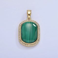 Description: Due to the nature of these gemstones a slight variation in colors / patterns may be noticed between the pictures and the real piece. - Material: Brass, 14K Gold Filled, Natural Gemstone (Malachite) - Size: 31.4mm x 17.6mm x 6.2mm  - Bail Size: 4mm  - Quantity: 1 piece - Color: Gold - Lead Free, Nickel Free Please avoid chemical solutions, perfumes, excessive sweat, seawater and/or pool water. Salt water and chlorine can damage your jewelry. Chlorine can damage and discolor metals th Gold Oblong Gemstone Jewelry, Oval Malachite Jewelry In Yellow Gold, Excessive Sweating, Sandwich Bags, Green Malachite, Pool Water, Keep Jewelry, Minimalist Jewelry, Charm Jewelry