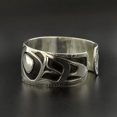 Northwest Coast Overlay Eagle Cuff Bracelet Sterling Silver | Etsy Unique Bangle With Polished Finish, Unique Round Bangle With Polished Finish, Unique Polished Cuff Jewelry, Unique Round Cuff Bracelet With Polished Finish, Unique Adjustable Cuff Bracelet With Polished Finish, Symbolic Engraved Cuff Bangle Bracelet, Symbolic Stamped Cuff Bracelet, Unique Polished Cuff Bracelet As Gift, Unique Polished Finish Cuff Bracelet Gift