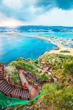 an aerial view of stairs leading down to the beach and ocean stock photo - 789782