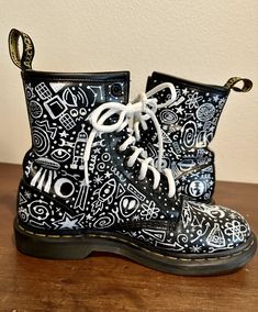 Dr. Martens hand painted with space doodles. One of a kind Custom White Artsy Artwork, Painted Doc Martens, Denim Cuff Bracelet, Hand Drawn Doodles, Space Doodles, Panel Jacket, Upcycled Dress, Aztec Fashion, Tablecloth Sizes