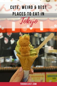 a person holding up an ice cream cone with the words cute, weird & best places to eat in tokyo