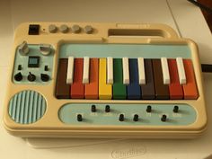 an electronic toy with many different colored keys