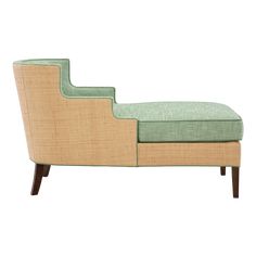 an upholstered chaise lounge chair with green fabric on the back and sides