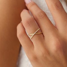 14k Gold Criss Cross Diamond Ring / Criss Cross Ring For Women / Solid Gold Statement Ring / Trendy Petite Dainty Diamond Ring by Ferkos ▶Item Details * Made to Order * Gold Kt: 14K (also available in 18K) * Available Gold Colors: Rose Gold, Yellow Gold, White Gold * Widest Part: 7.5MM * Round Diamond: 23 Pcs 1.0 MM * Diamond Color & Clarity: G Color SI Clarity * Diamond Ctw: 0.12 ctw * Ready to Ship in 3-10 Business Days ▶ See more of our Diamond Wedding Rings here - https://etsy.me/3YbpVq2 ▶ See our storefront here - http://etsy.me/2lUcVnH  ▶ All store sections here * Diamond Rings - http://etsy.me/2lwKUl8 * Diamond Earrings - http://etsy.me/2lyqVBP * Diamond Necklace - http://etsy.me/2mqa6O1 * Diamond Bracelets - http://etsy.me/2mVrAB5 * Diamond Wedding Rings - https://etsy.me/3YbpVq2 * Cross Diamond Ring, Wedding Band For Women, Dainty Diamond Ring, Criss Cross Ring, Mens Diamond Wedding Bands, Moissanite Bridal Sets, Gold Armband, Moissanite Necklace, Gold Statement Ring