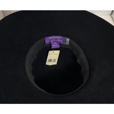 This beautiful Purple Label rabbit fur felt hat in black with a black grosgrain ribbon was made for Ralph Lauren by Patricia Underwood. Size Small/Medium the interior band measures 21.5” It still has its original tags from the Madison Avenue flagship store. Black Wool Cloche Hat With Flat Brim, Black Fur Felt Wide Brim Cloche Hat, Black Wide Brim Fur Felt Cloche Hat, Black Fur Felt Wide Brim Hat, Black Fur Felt Cloche Hat With Wide Brim, Black Wide Brim Cloche Hat In Fur Felt, Black Wide Brim Fur Felt Hat, Black Curved Brim Cloche Hat In Fur Felt, Formal Black Fur Felt Hat Bands