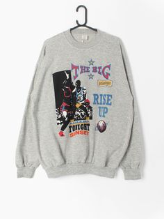 Vintage 90s basketball graphic sweatshirt with LA Lakers , The big victory and rise up designs. Looks awesome and inside is really soft!  Our recommended size: Large to XL  mens (please check specific measurements below) Label Says: XL Condition: Very good. Small mark on back centre (see final pics, not colour accurate)  Material: 50% cotton, 50% acrylic Measurements in inches: Pit to pit: 24 Shoulders: 24 Front length: 29.5 Back length: 29.5 Sleeve length: 24 Collar to cuff: 32 We recommend tha Throwback Sports Sweatshirt With Graphic Print, Throwback Graphic Print Sweatshirt For Sports, 90s Graphic Print Sweatshirt For Sports Season, Hip Hop Graphic Print Sweatshirt For Sports Season, Vintage Graphic Print Sweatshirt For Sports Season, Oversized Graphic Print Sweatshirt For Sports, Rise Up, 90s Basketball, Wet Dreams