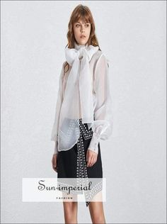 Gender: WomenMaterial: COTTONMaterial: PolyesterClothing Length: REGULARStyle:VintageFabric Type: WovenSleeve Length(cm): FullDecoration: ButtonPattern Type: SolidCollar: BowSleeve Style: lantern Sleeve SIZE S:length:53cm,bust:98cm,shoulder:38cm,sleeve length:64cm M:length:53cm,bust:102cm,shoulder:40cm,sleeve length:66cm L:length:53cm,bust:106cm,shoulder:41cm,sleeve length:67cm Note: 1 inch = 2.54 cm, 1 cm = 0.39 inch note: measurement by hands allow 2-3cm errors which is normal Sizing advice : Suits For Bride, Wedding Suits For Bride, Long Sleeve Loose Blouse, Women White Blouse, Bow Collar, High Street Fashion, Women Blouse, Loose Blouse, Work Outfits Women