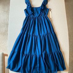 New Item With Tags Ruffled Navy Blue Sun Dress Sleeveless Maxi Brand: Penelope Rose Tag Size: Women Medium Please See Approximate Measurements Armpit To Armpit 17" Length 48" Waist 13/5-14" (Stretches) Body 80% Polyester 20% Cotton Lining 100% Polyester Hand Wash Cold Inside Out Blue Ruffled Midi Sundress, Blue Midi Sundress With Ruffles, Casual Blue Sleeveless Dress With Ruffles, Blue Sleeveless Midi Dress With Ruffles, Blue Ruffled Midi Sleeveless Dress, Blue Midi Sleeveless Summer Dress, Blue Sleeveless Midi Summer Dress, Blue Sleeveless Midi Dress For Summer, Blue Midi Sleeveless Dress With Ruffles