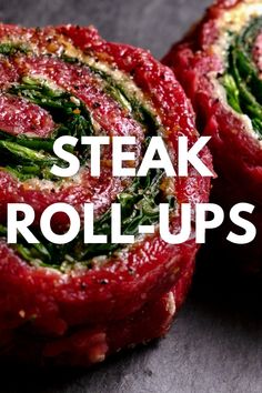 steak roll ups with spinach and cheese on top, sitting on a table in front of the words steak roll - ups