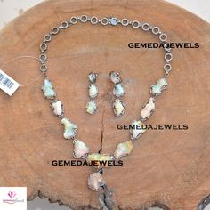 Opal Gemstone Necklace, Pave Diamond Necklace Earrings Set, Opal Dangle Earrings, 925 Silver Link Chain Jewelry, Bridesmaid Jewelry Gift 1) Necklace Details Gross Weight: 44.00 gram Diamond Weight: 6.24 Cts Gemstone Weight: 54.16 Cts Necklace Length: 18 inch 2) Earrings Details Gross Weight: 9.76 gram Diamond Weight: 1.56 Cts Gemstone Weight: 13.55 Cts Earrings Size: 46X10 MM NOTE:- All The Products Are Designed And Manufactured In My Workshop By Me & My Team. Shown Products Are Purely Handm Silver Dangle Gemstone Jewelry, Silver Opal Jewelry With Natural Stones, Silver Opal Dangle Jewelry, Opal Jewelry With Stones For Gift, Sterling Silver Stones Jewelry For Anniversary, Sterling Silver Teardrop Jewelry With Natural Stones, Opal Jewelry With Stones As A Gift, Sterling Silver Jewelry With Stones For Anniversary, Silver Dangle Fine Jewelry Sets