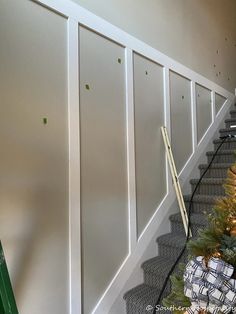 a christmas tree sitting on top of a set of stairs