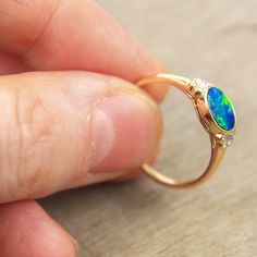 Australian Black Opal Engagement Ring, Unique Promise Rings for Her, Genuine Diamonds & 7x5mm Opal Doublet in 14K or 18K Solid Gold Ring - Etsy Unique Promise Rings For Her, Black Opal Engagement Ring, Opal Promise Ring, Unique Promise Rings, Blue Opal Ring, Pentagram Pendant, Australian Black Opal, Black Opal Ring, Opal Engagement Ring