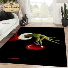 a living room area rug with an evil creature on it