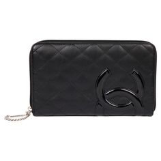 Chanel Black Quilted Lambskin & Patent Leather Cambon Long Zipped Wallet Brand- Chanel Model- Cambon Long Wallet Product Type- Wallet Serial Number- 14****** Age- Circa 2010 Accompanied By- Chanel Authenticity Card Colour- Black Hardware- Silver Material(s)- Lambskin Leather, Patent Leather Authenticity Details- Serial Sticker, Authenticity Card Height- 13cm Width- 22cm Depth- 2cm Interior- Pink Textile Closure- Zip Country of Origin- Italy Condition Rating- Excellent Exterior Condition- The ext Pink Textile, Vintage Chanel Bag, Leather Trunk, Chanel Brand, Silver Monogram, Chanel Model, Chanel Vintage, Black Quilt, Chanel Black