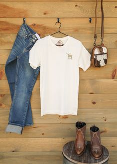 Rope Me I Wanna Play Tee Add a hint of Western fun to your look with the Rope Me I Wanna Play graphic tee! This sassy graphic cream colored tee with a brown Western graphic design features short sleeves, crew neckline, and is perfect for your layering needs or wearing alone. Show off your western style and pair it with your favorite jeans, shorts, or sweats. Product Details Graphic Tee Quote Cream Color Brown Graphic Design Short Sleeves Crew Neckline Unisex Sizing - Small, Medium, Large, XLarge Brown Graphic Design, Western Graphic Design, Quote Tees, Western Style, Favorite Jeans, Jeans Shorts, Western Fashion, Crew Neckline, Cream Color