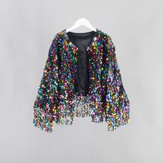 Welcome to my shop, I am in China. It will need around 20 days for international orders. Please consider the time when placing order. Quicker express DHL,Fedex,UPS available(NEED ADD SHIPPING COST). Please send us a message with any questions or deadlines before placing order! This sequins fringe jacket is handmade with love,perfect for concert, wedding,birthday,party,costume event,rave and so on. This item is made to order - and can be custom made. Not accept returns or replacement. Please carefully check each sizes: S US women's 0-4 Shoulder width: 16.5 inches(42cm) Bust width:20.5 inches(52cm) Sleeve length:20 inches(50cm) M US women's 6-8 Shoulder width: 17.7 inches(45cm) Bust width:21.5 inches(55cm) Sleeve length:21.5 inches(55cm) L US women's 10-12 Shoulder width: 19 inches(48cm) Bus Luxury Sequined Outerwear For Festive Occasions, Cheap Sequined Outerwear For Fall, Cheap Sequined Winter Outerwear, Sequin Fringe Jacket, Tinsel Dress, Concert Wedding, Babysitting Crafts, Fringe Clothing, Short Sleeve Kimono