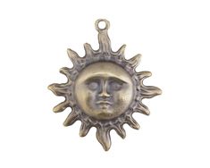 the face of a sun is shown in this antique brass finish pendant, which features an intricate