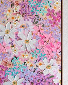 a painting with flowers painted on it