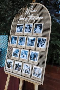 a wooden easel with pictures on it