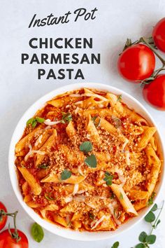 a bowl of chicken parmesan pasta with tomatoes on the side and text overlay that reads instant pot chicken parmesan pasta