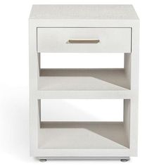 a white nightstand with two drawers on each side and one drawer open in the middle