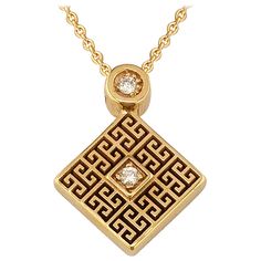 S.Georgios designer pendant enhancer and chain is handmade from solid 18 Karat Yellow Gold and carved forming a Greek Key design, which is the symbol of eternity. This stunning pendant features 2 brilliant-cut White Diamonds with a total weight of 0.03 Carat and is finished with black Rhodium in the Greek Key openings giving it a beautiful and unique appereance. We also make this gorgeous pendant necklace in White and Rose Gold, with different stone selections, and at your desired chain length, Luxury Polished Pendant Custom Necklace, Gold Diamond Jewelry With Intaglio, Designer Engraved Necklaces For Formal Occasions, Luxury Carved Yellow Gold Necklaces, Luxury Carved Gold Necklace, Luxury Carved Gold Jewelry, Luxury Medallion Necklace With Intaglio, Luxury Jewelry With Detachable Square Pendant, Elegant Carved Round Pendant Necklace