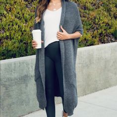 Super Soft Chunky Knit Shayla Cardigan Duster 100% Acrylic Color: Dark Gray Cozy Gray Acrylic Outerwear, Gray Soft Knit Acrylic Outerwear, Gray Acrylic Cardigan For Fall, Casual Knitted Outerwear One Size, Soft Knit Acrylic Cardigan For Cold Weather, Cozy Textured Knit Sweater Vest For Fall, Acrylic Cardigan For Layering, Winter Chunky Knit Sweater Vest For Layering, Gray Knitted Sweater Coat