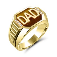 This bold men's ring features a striking combination of gemstones symbolizing a father's strength and protection. A rich, golden tiger's eye takes center stage, flanked by 8 brilliant white topaz gemstones. The word "DAD" is featured in raised relief, making this a meaningful and stylish gift for fathers. Brown Polished Signet Ring For Anniversary, Brown Polished Finish Signet Ring For Anniversary, Polished Finish Signet Ring For Father's Day Anniversary, Mens Watches Military, Military Jewelry, Dad Jewelry, Coin Display, Pearl And Diamond Necklace, Romantic Gifts For Her