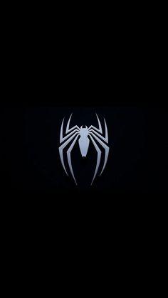 the amazing spider man logo on a black background wallpapers for walls and laptops