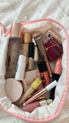 makeup clean girl trendy pink charlotte tilbury benefit cosmetics tarte glossier patric ta blush bronzer thatgirl Clean Girl Makeup Products, Charlotte Tilbury Bronzer, Benefit Bronzer, Trendy Makeup Products, In My Makeup Bag, My Makeup Bag, Makeup Clean, Routine Aesthetic