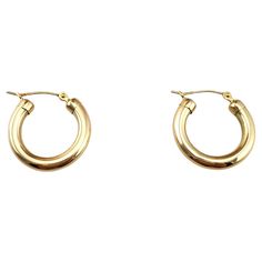 14K Yellow Gold Hoop Earrings Indulge in classic sophistication with our 14K Yellow Gold Hoop Earrings, a staple in every jewelry collection. Hallmark: A + Z 14 Weight: 1.2 g/ 0.8 dwt. Thickness: 3.3 mm Diameter: 19.8 mm Very good condition, professionally polished. Will come packaged in a gift box or pouch (when possible) and will be shipped U.S. Priority Mail Insured. AD062324/17KCS 14k Yellow Gold Round Hoop Earrings, Vintage Yellow Gold Pierced Hoop Earrings, Cheap Yellow Hoop Earrings, Single Small Hoop Yellow Earring, Vintage Yellow Gold Hoop Earrings, Modern Hoop Earrings, Gold Hoops, Modern Earrings, Gold Hoop