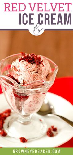 red velvet ice cream in a glass bowl on a white plate with a spoon next to it