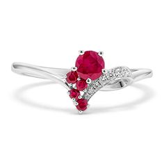 Beautiful and unique  this natural gemstone ring is crafted in bright 14-karat white gold. It features cascading rubies for a vibrant pop of color and sparkling diamond accents. Platinum Rings With Red Diamond Accents, Red Platinum Rings With Diamond Accents, Cluster Diamond Ruby Ring In White Gold, White Gold Cluster Ruby Ring With Diamonds, Red Multi-stone Diamond Promise Ring, White Gold Ruby Birthstone Ring, Fine Jewelry Ruby Ring With Accent Stones In Platinum, White Gold Ruby Multi-stone Diamond Ring, White Gold Ring With Diamond Accents And Lab-created Ruby