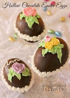 three chocolate easter eggs with flowers on them