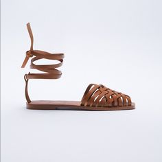 Genuine Zara New With Tag Material: Cow Leather Color: Brown Durable Leather Sandals, Love Weaving Pattern. Looks Great With Most Warm Weather Outfits.. Euro Size 37(6.5), 38(7.5), 41(10) Vacation Leather Ankle Tie Sandals, Leather Ankle Tie Sandals For Vacation, Ankle Tie Leather Sandals For Vacation, Brown Leather Sandals With Ankle Tie, Brown Leather Ankle Tie Sandals, Leather Summer Lace-up Sandals With Ankle Strap, Flat Leather Lace-up Sandals For Vacation, Summer Leather Lace-up Sandals With Ankle Strap, Leather Ankle Tie Lace-up Sandals For Vacation