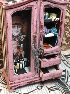 a pink cabinet with an image of a clown on it