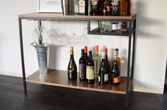 several bottles of wine are sitting on a shelf