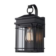 an outdoor wall light with two bulbs on it