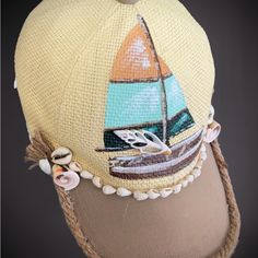 Nautical Theme Baseball Cap ~ Hand Painted Sail Boat ~ Hand Made By Liz Price: $25 Location: Punta Gorda Isles, Florida Materials: New, Used, And . Vintage Elements Artistically Combined Used Baseball Cap Cotton Exotic. . Shells Beads Buttons Twine . Lots Of Glue As An Interior Designer, I Have Accumulated Interesting "Spare Parts" Over The Years, So Decided To Utilize Them To Fabricate Hats, Jewelry, Decorative Accents And Accessories I Have Several Custom Made Creations Ready For Purchase. Ple Adjustable Nautical Hats For The Beach, Nautical Style Beach Hat With Curved Brim, Adjustable Beige Baseball Cap For The Beach, Cream Visor Hat For Vacation, Nautical Beach Hat With Curved Brim, Nautical Hat With Adjustable Fit And Curved Brim, Cream Visor Hat For The Beach, Adjustable Nautical Beach Hat, Beige Baseball Cap For The Beach